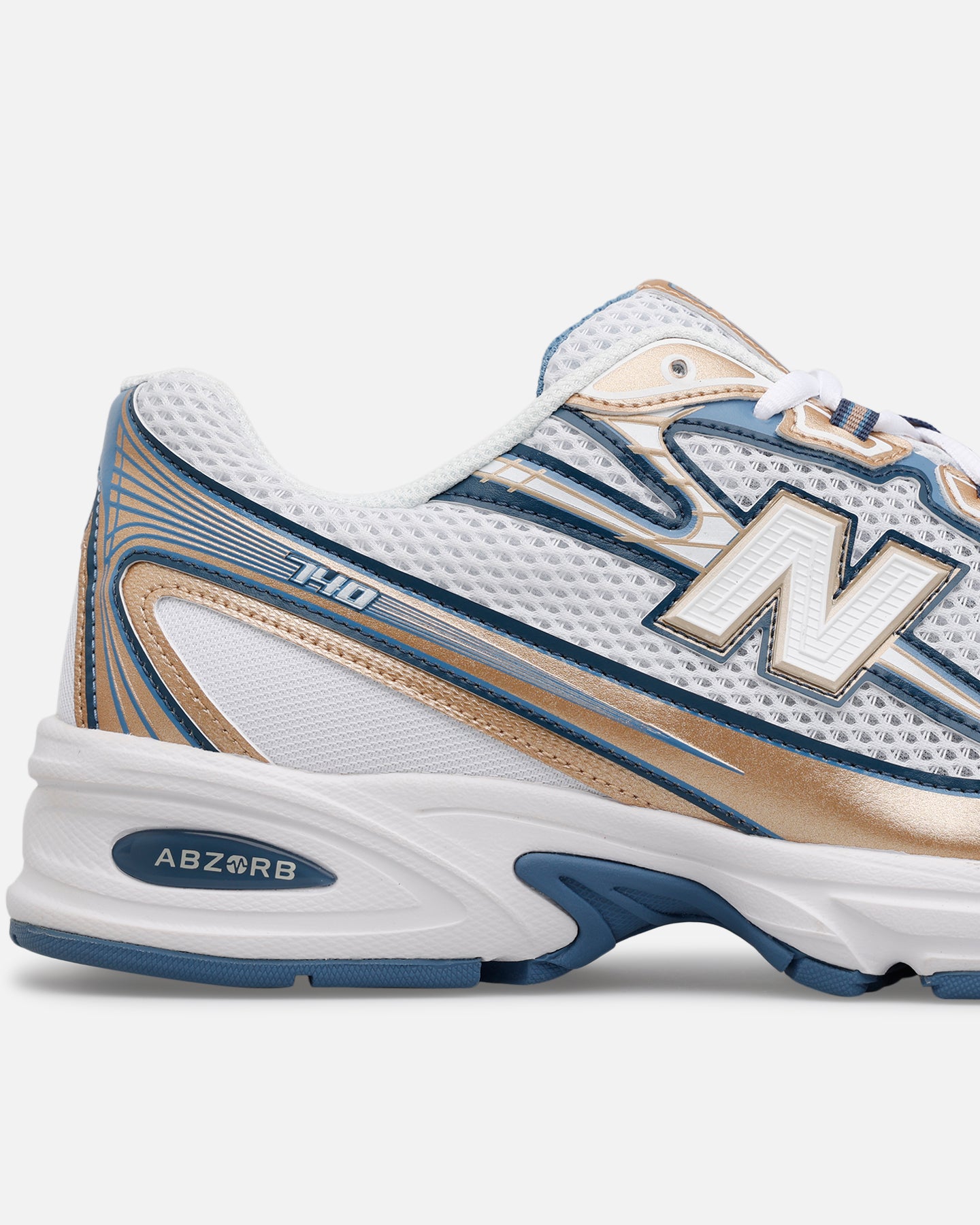 New Balance 740 Blue/Gold - A Stunning Athletic Shoe