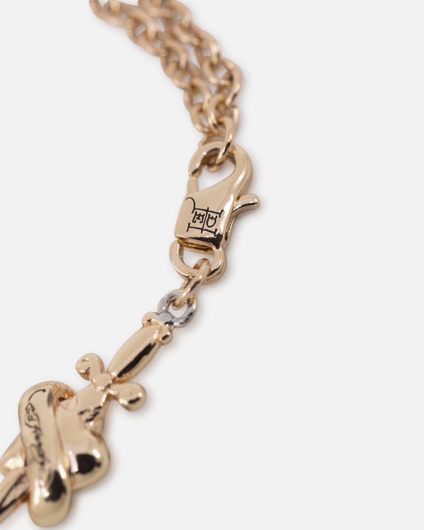 Ed Hardy Heart & Dagger Gold Bracelet - A Stunning Accessory